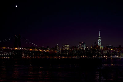 Illuminated cityscape at night