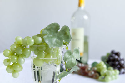 Close-up of grapes on drink