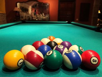 Close-up of multi colored balls on table