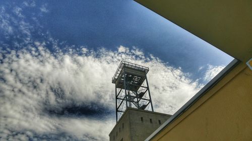 Low angle view of water tower against sky