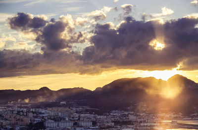 View of cityscape against sky during sunset