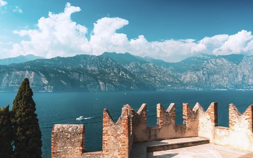 Panoramic view of sea and buildings against sky