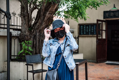 Full length of woman standing outdoors