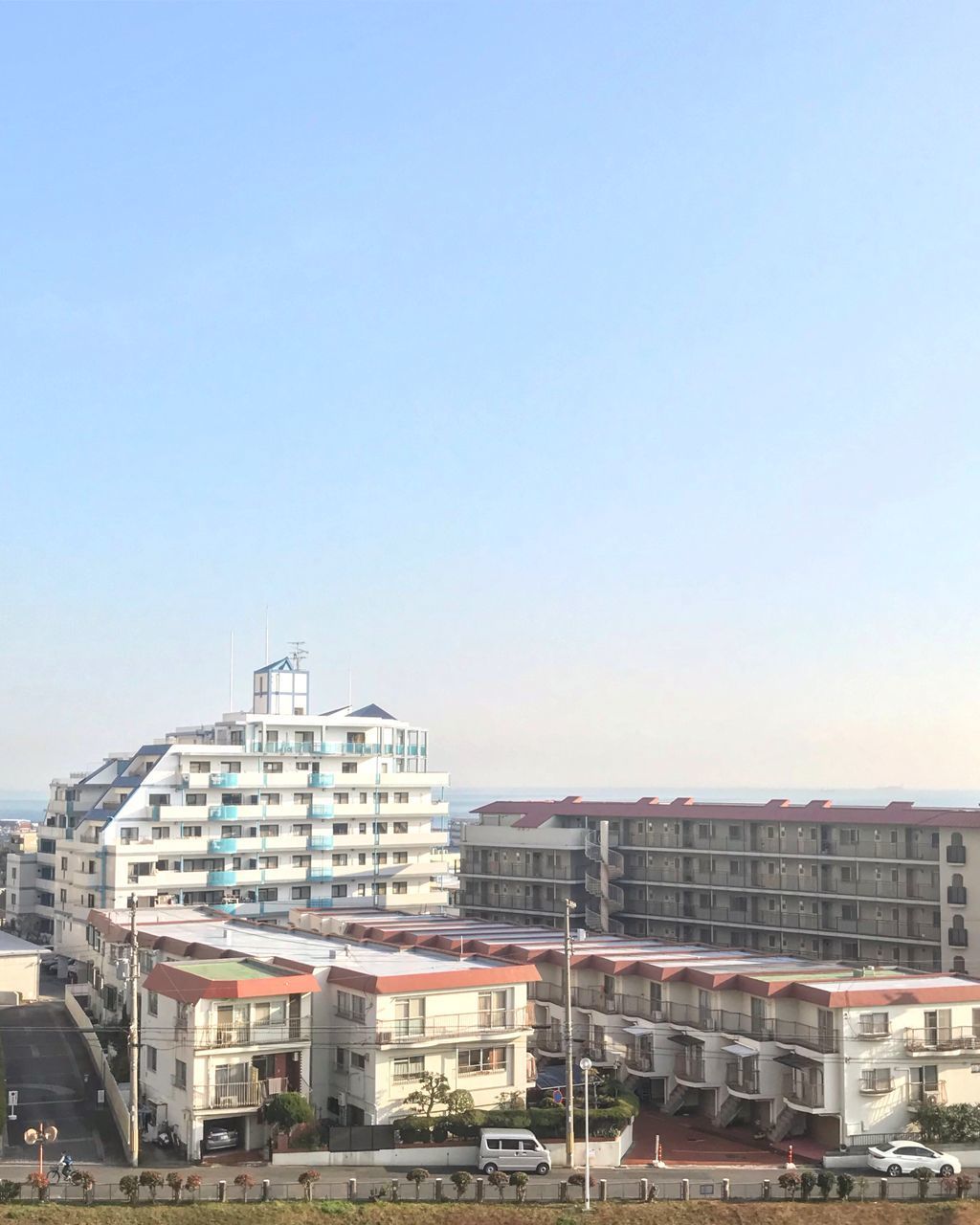 MODERN BUILDINGS AGAINST CLEAR SKY