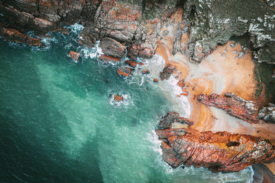 High angle view of rock formation in water