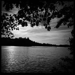 Scenic view of lake at sunset