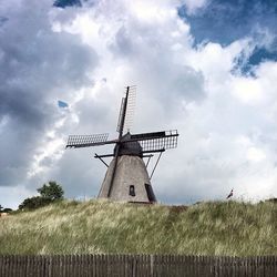 Wind turbines in field