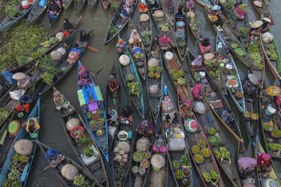 High angle view of people at street market