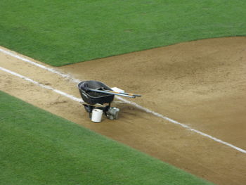 High angle view of man playing with umbrella