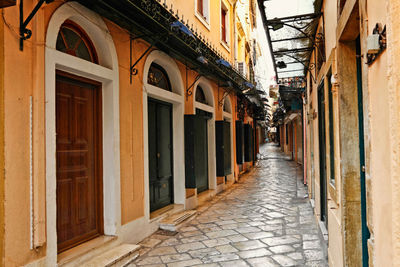 Alley amidst buildings in city