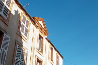 Low angle view of building against clear sky