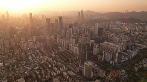 High angle view of cityscape against sky during sunset