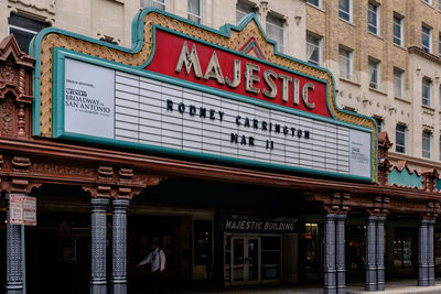 Low angle view of text on building