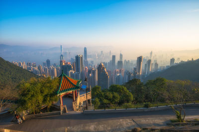 Victoria peak at sunrise time. skyscraper view from famous place of hong kong city