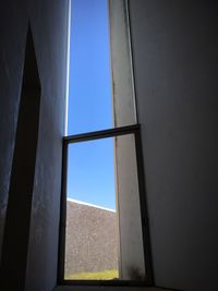 Low angle view of building against blue sky