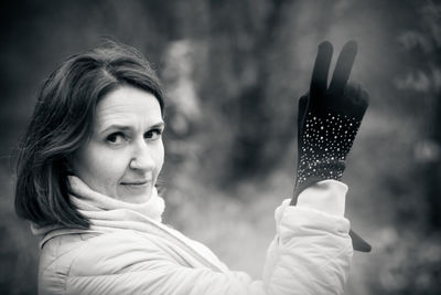 Portrait of woman holding outdoors