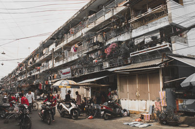 People at market stall