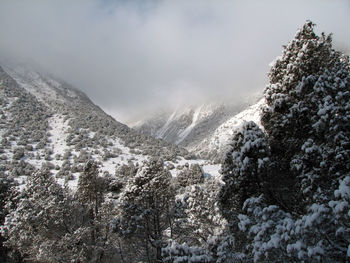 Scenic view of mountains against sky during winter