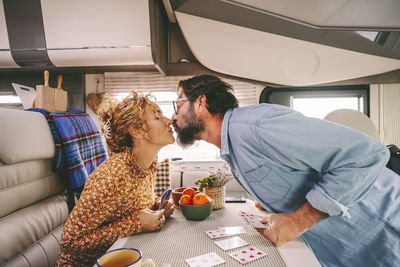 Couple kissing in motor home