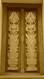 Carving on wall