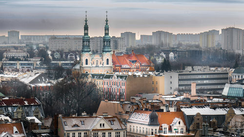 Cityscape against sky during sunset