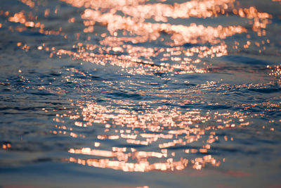 Aerial view of sea against sky at sunset