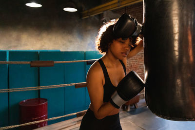 Portrait of woman standing in gym