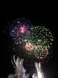 Firework display at night