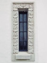 Low angle view of closed door of building