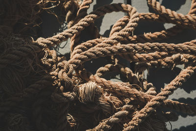 High angle view of old rope on floor