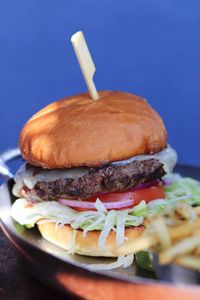 Close-up of burger in plate on table