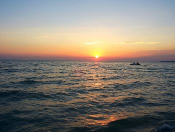 View of calm sea at sunset