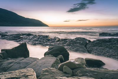 Scenic view of sea against sky during sunset