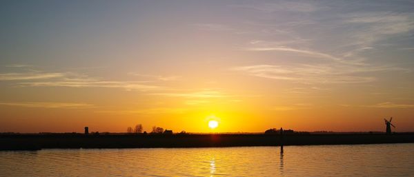 Scenic view of sunset over sea