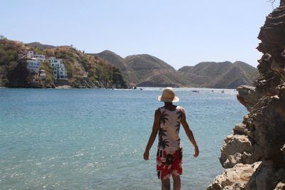 People standing on rocks