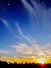 Scenic view of silhouette landscape against sky during sunset