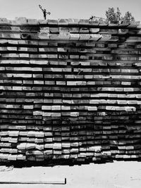 Low angle view of brick wall against sky