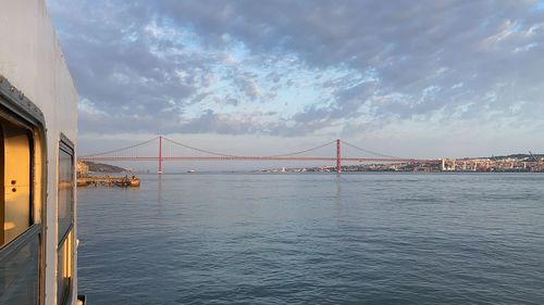 View of suspension bridge over sea