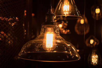 Close-up of illuminated light bulb