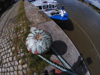 High angle view of boats moored at harbor