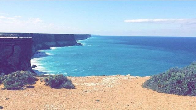 sea, horizon over water, beach, blue, seascape, scenics, nature, beauty in nature, idyllic, coastline, tranquil scene, sky, tranquility, outdoors, water, day, travel destinations, wave, landscape, no people