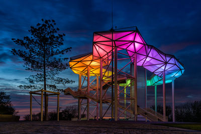 Plattform on mountain against sky at sunset