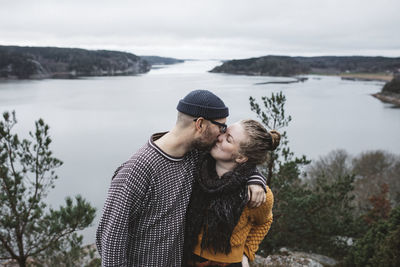 Couple kissing in lake