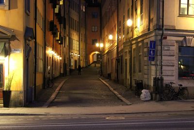 Illuminated street at night