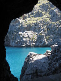 Scenic view of rock formation in sea