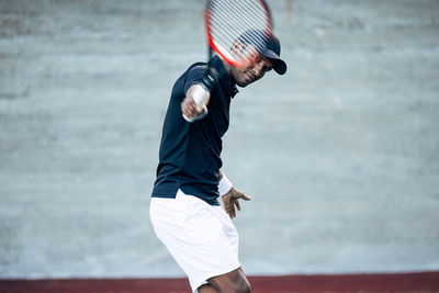 Man playing tennis