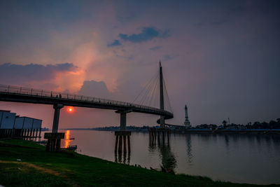 View of suspension bridge at sunset