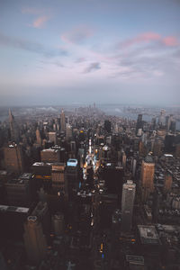 High angle view of buildings in city against sky