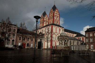 Low angle view of building against sky in city