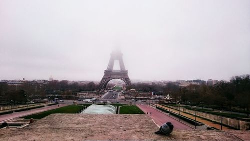 City seen through arch window